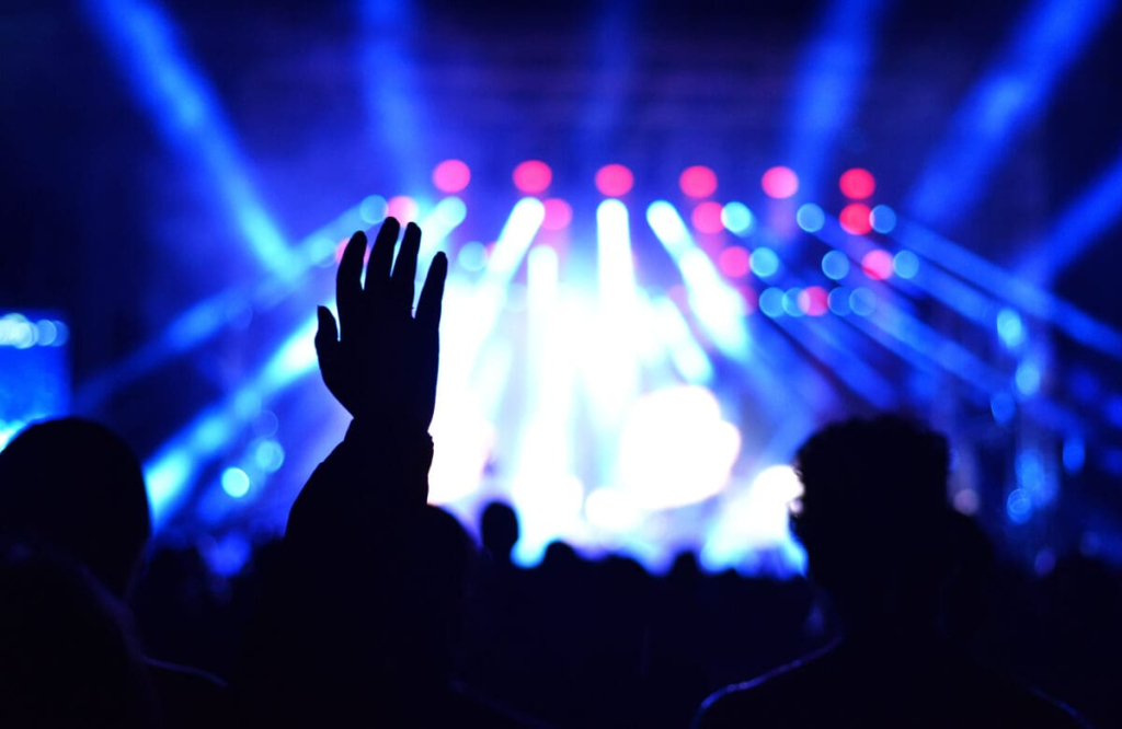 Silhouette-of-concert-crowd-in-front-of-stage-lights-at-music-festival-live-2291695-1200x781